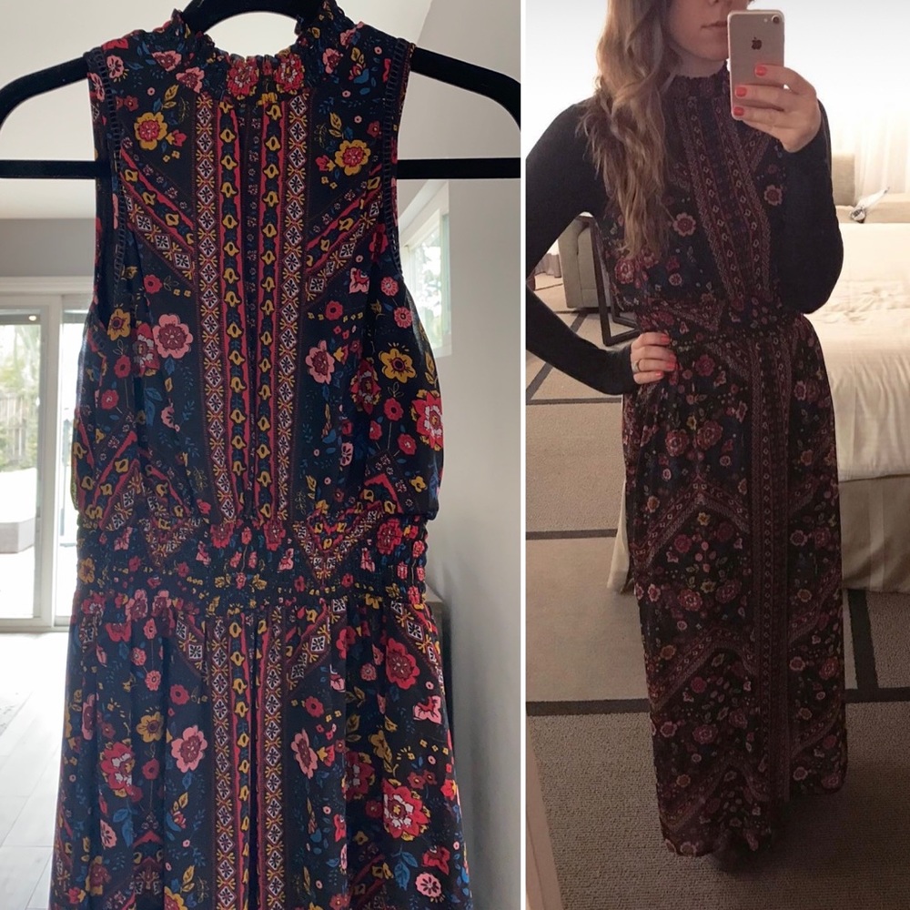 Exhilaration size medium flowered sleeveless dress.